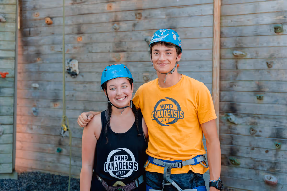 Two colleagues working abroad at summer camp.