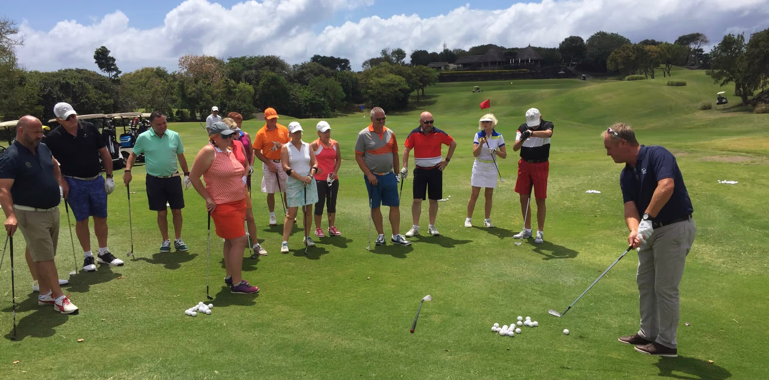 Jacques Gous, PGA Pro and Tour Escort, demonstrates his swing an an escorted golf tour in South Africa