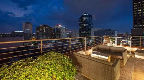 Penthouse terrace with the city view at night time
