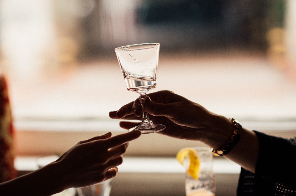 cocktail from Loa Bar being shared