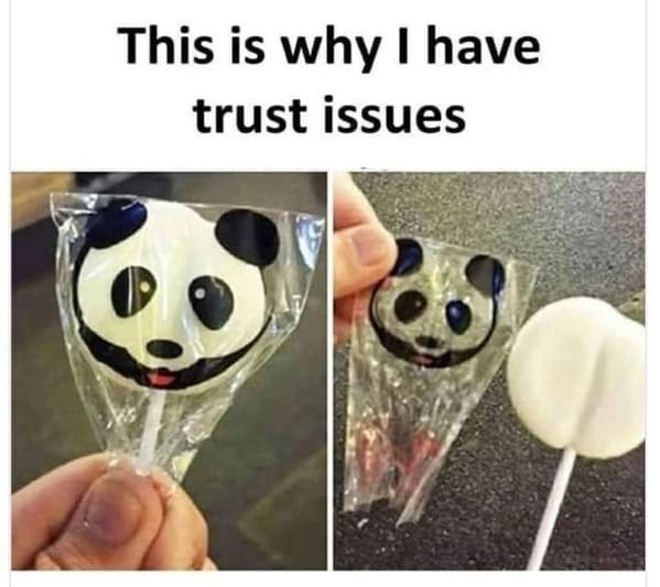 A meme displays two images of a panda lollipop, one in its wrapper showing the full panda face and the other unwrapped, revealing a plain white, heart-shaped candy. The text above reads, "This is why I have trust issues," highlighting the deceptive packaging.