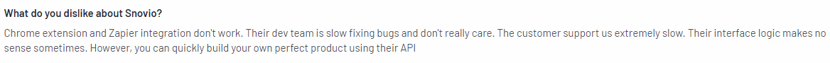 A customer review stating "What do you dislike about Snovio?" criticizing the Chrome extension, Zapier integration, slow development, and poor customer support.
