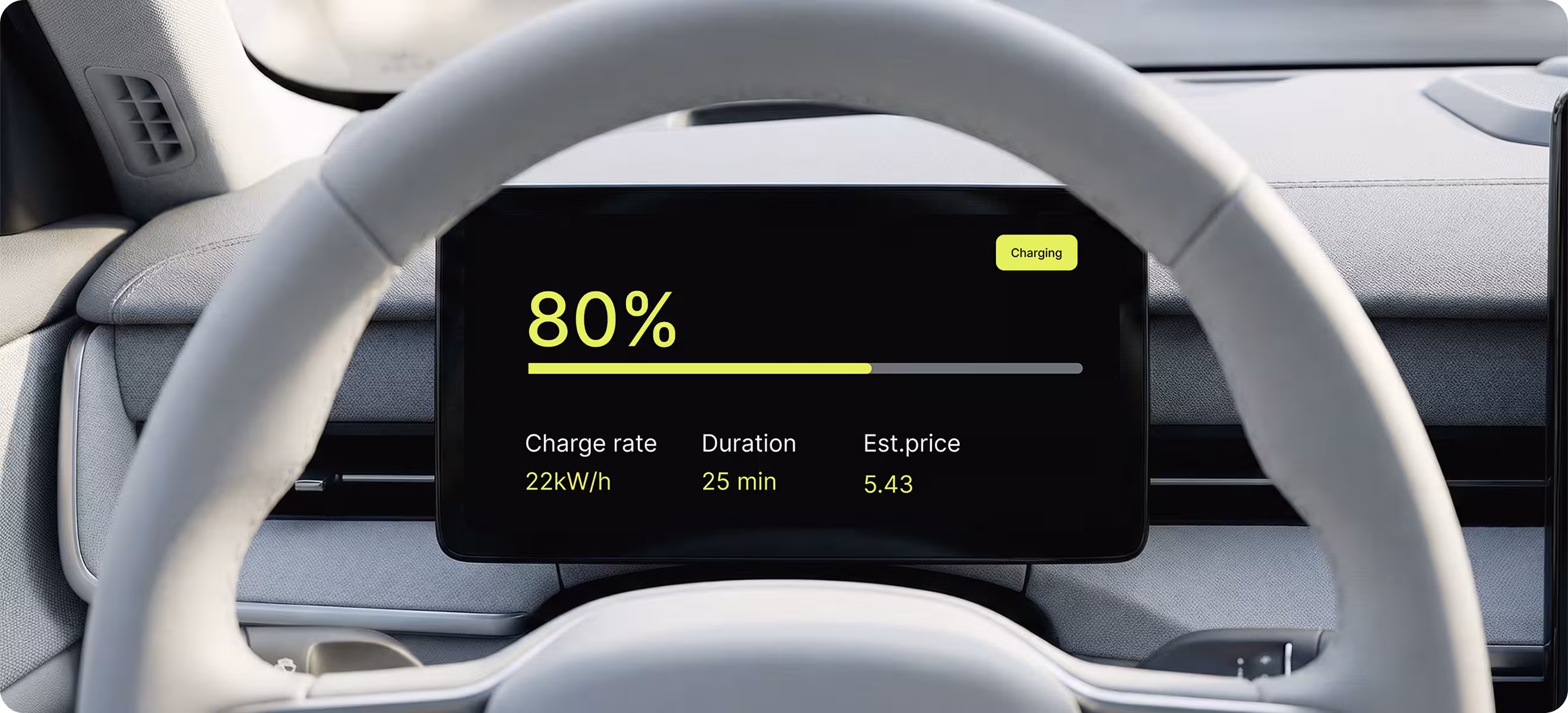 Car dashboard view through steering wheel showing 80% battery charge on digital display with charge rate 22 kW/h, duration 25 min, and estimated price 5.43.