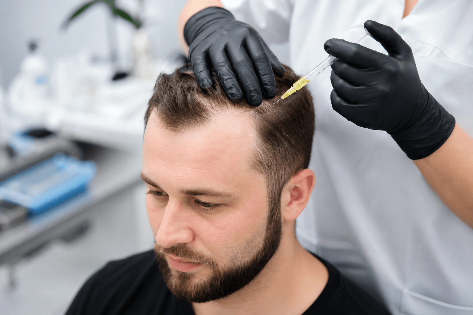 Patient receiving PRP hair restoration treatment for hair growth in Louisville, Kentucky