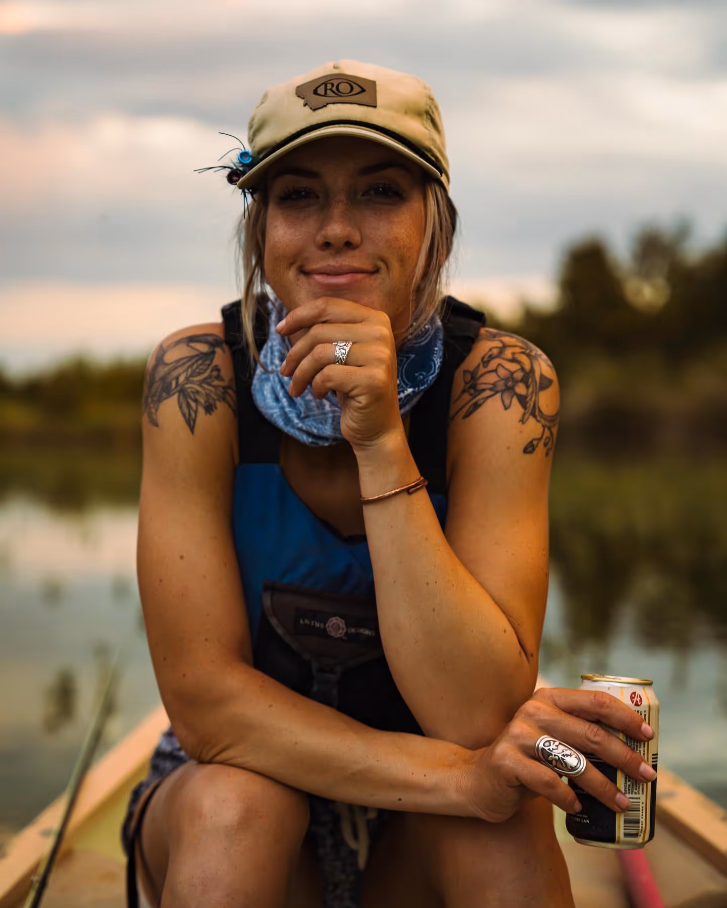 fly fishing guide on river smiling