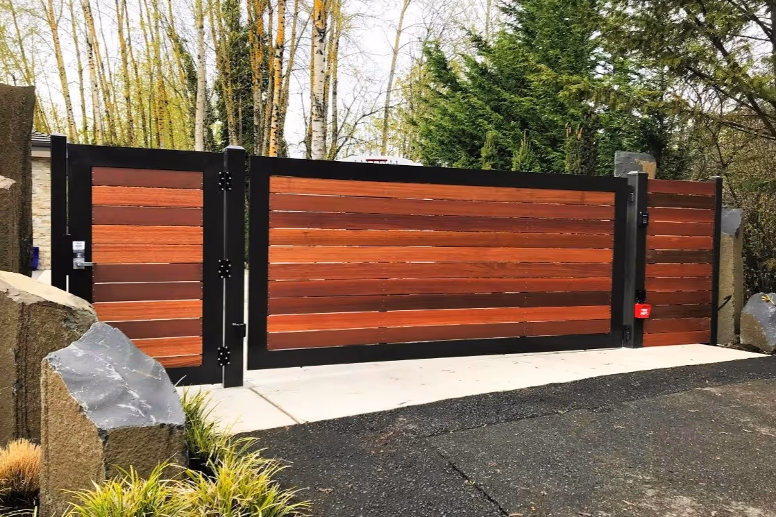 decorated Swing Wood Driveway Gate for Residences in Ravensdale, WA