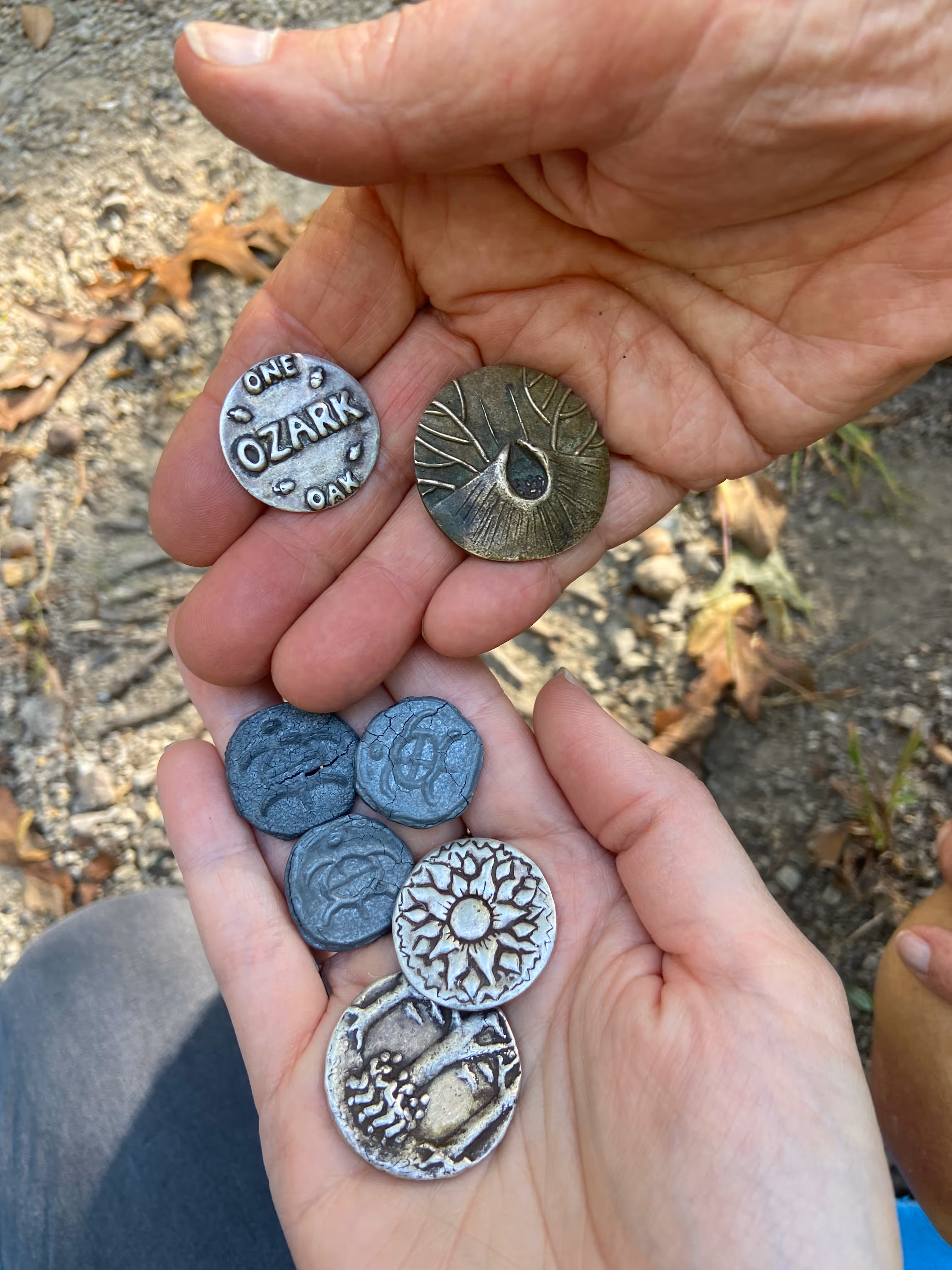 two hands holding money