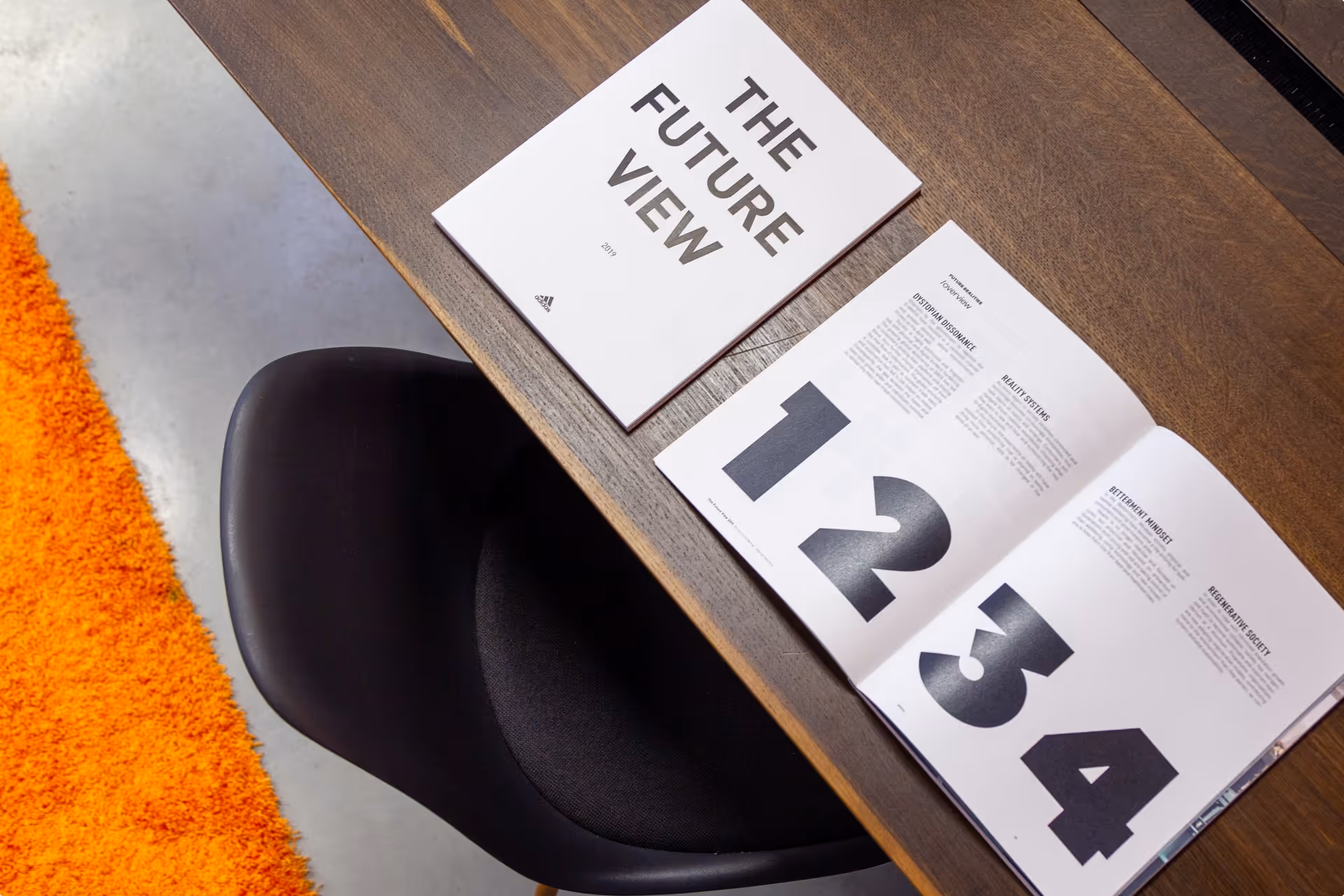 Dynamic design elements from Adidas’s ‘The Future View’ report, with pages illustrating numbers and layout innovations