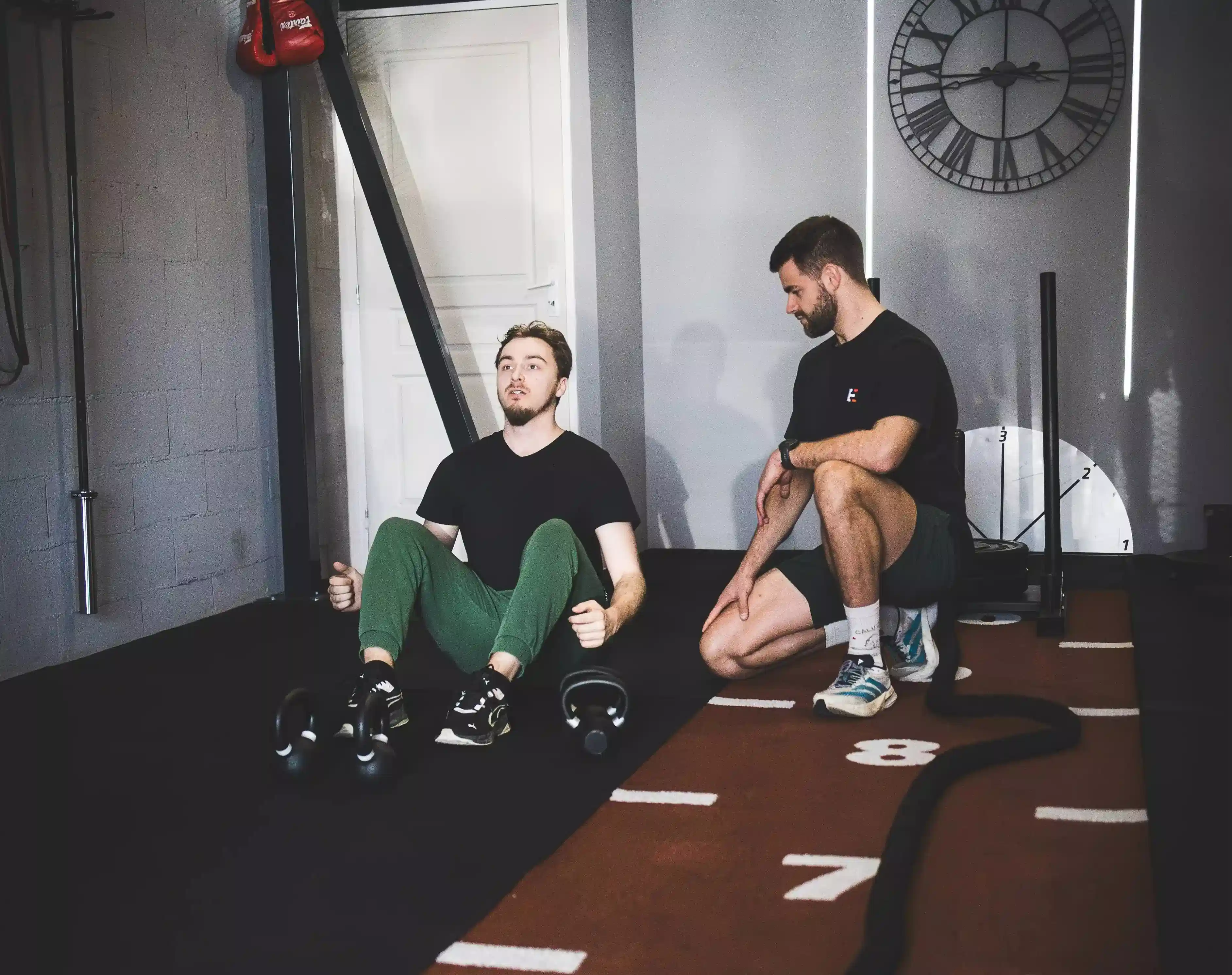 coach sportif en salle de sport