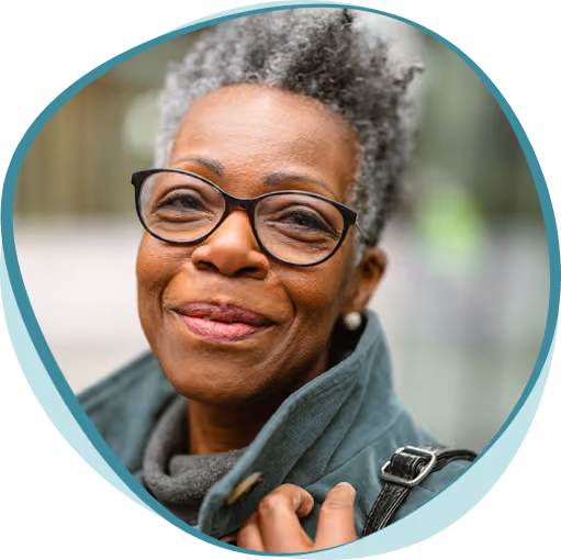 Portrait of a senior adult black female on a city street looking at the camera