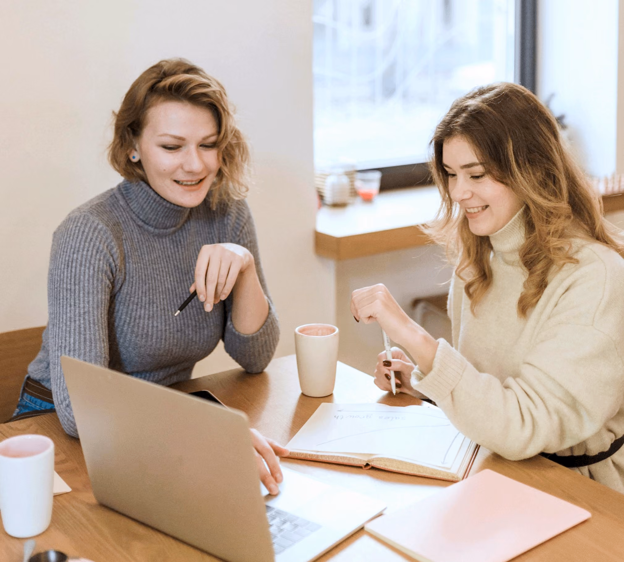 Two women speaking about business