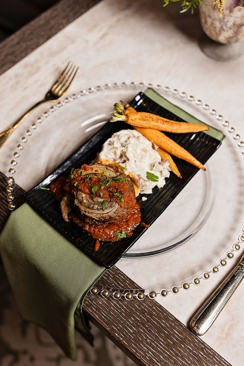 Locally sourced beef entree plated by DSquared Hospitality chefs