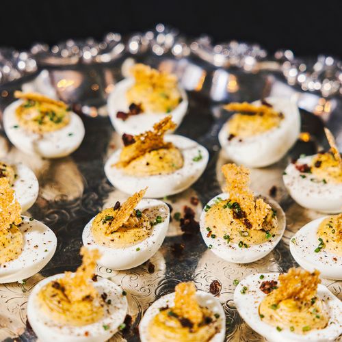 Thanksgiving Deviled Eggs by Tuxedos & Tennis Shoes Catering, a DSquared Hospitality Company located in Seattle, WA