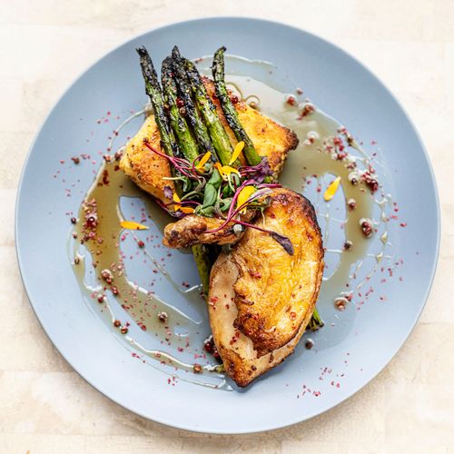 Farm-to-table chicken wedding entree by Tuxedos & Tennis Shoes Catering, a DSquared Hospitality Company located in Seattle, WA