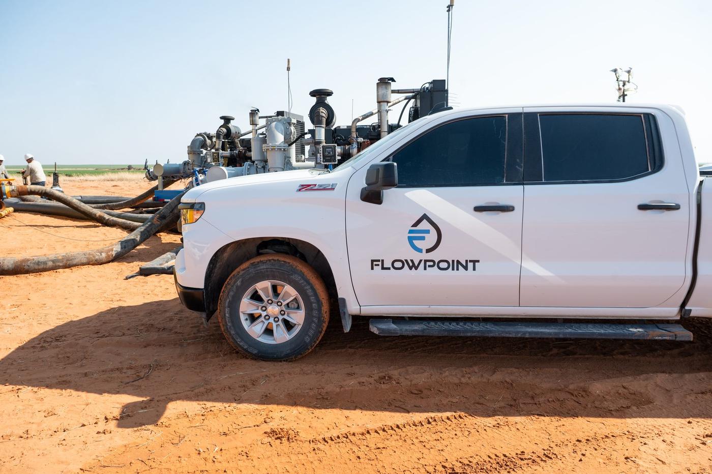 Flowpoint truck and pump package staged on a Permian Basin location