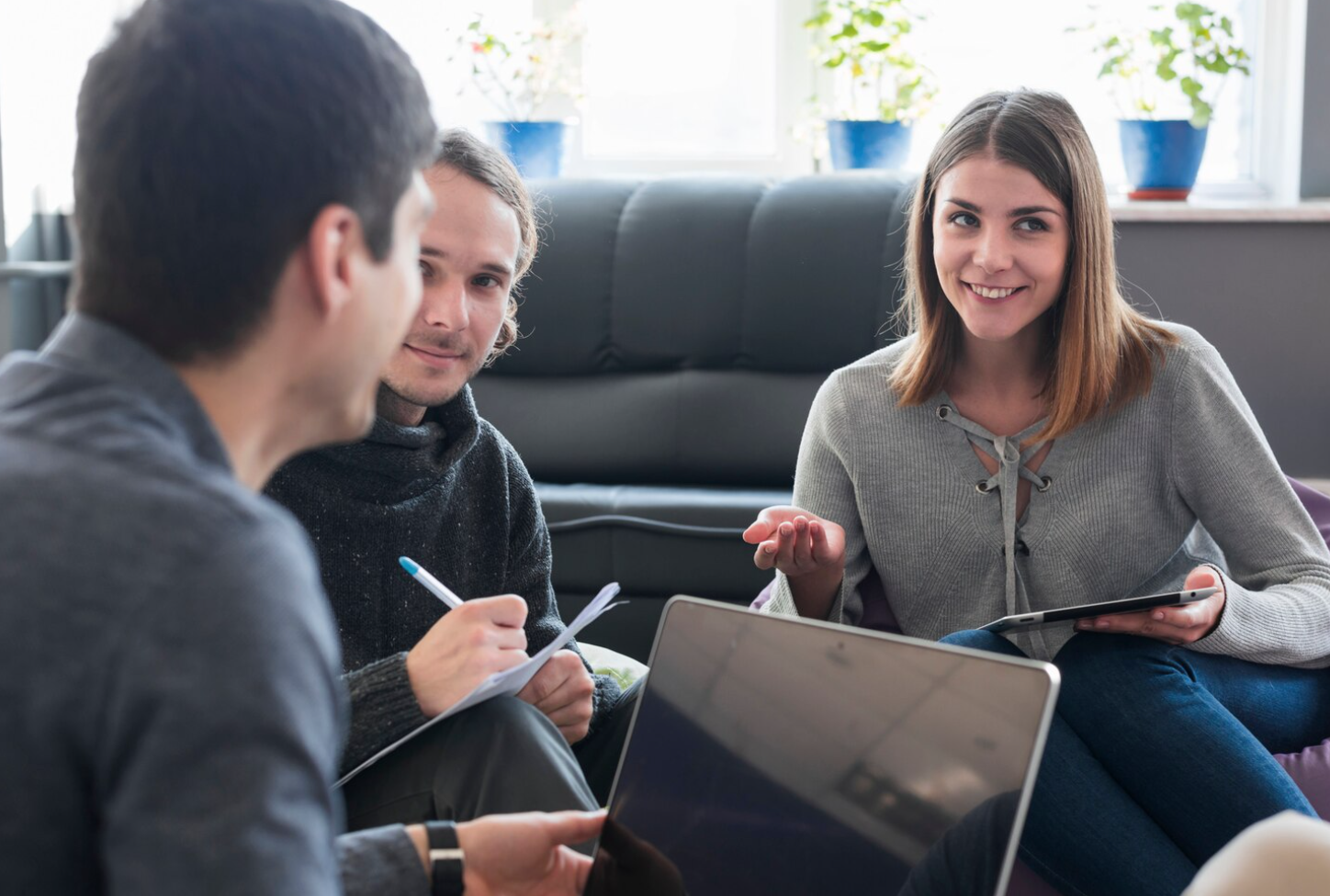 Group discussion with a counselor, showing ongoing support and communication during recovery