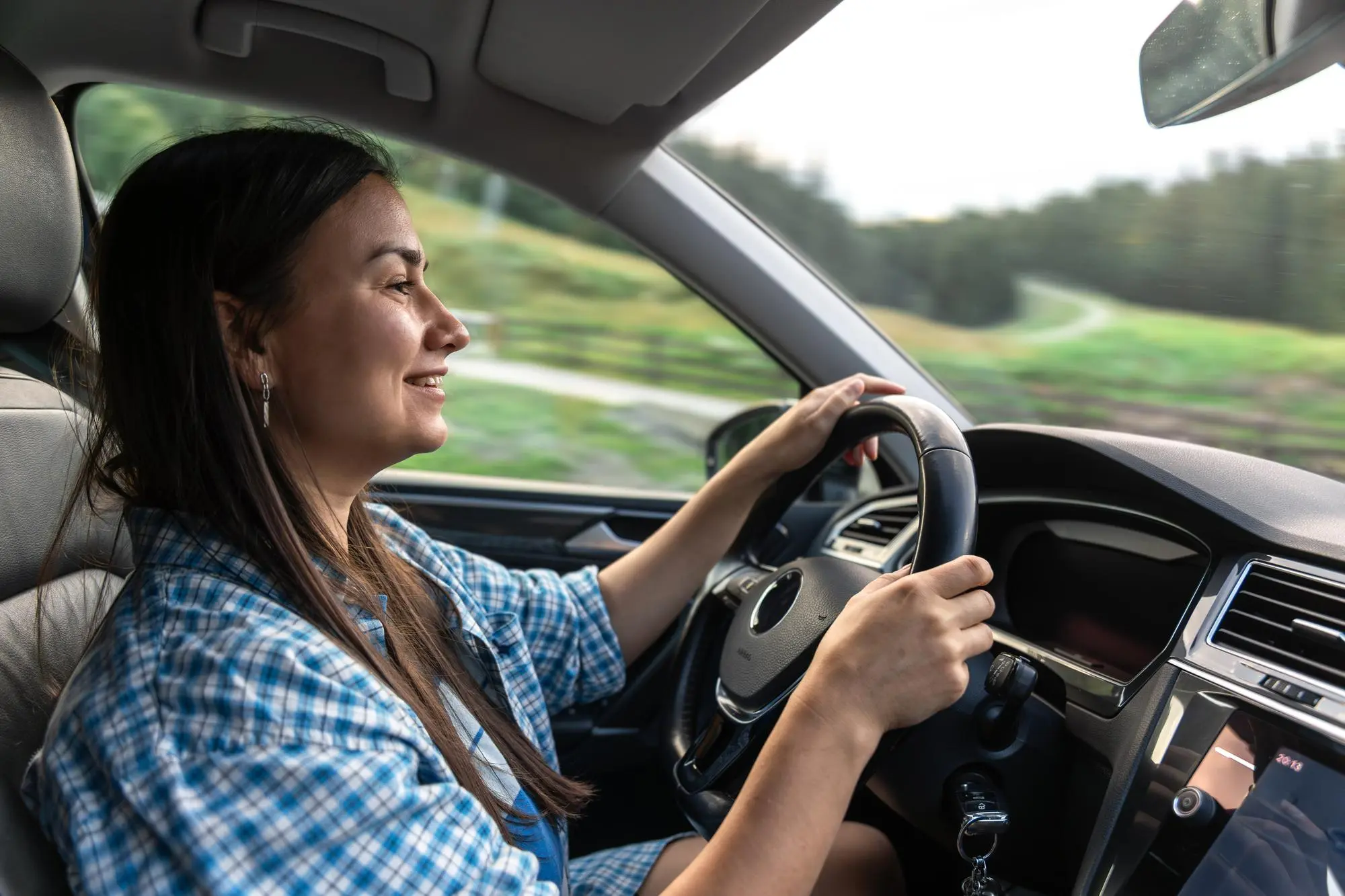 A woman makes a safe and responsible choice while driving after completing DUII education.