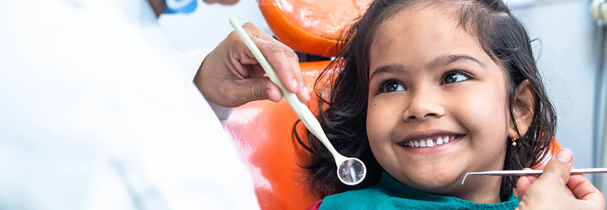 Cute little girl sees dentist for emergency dentistry in San Jose