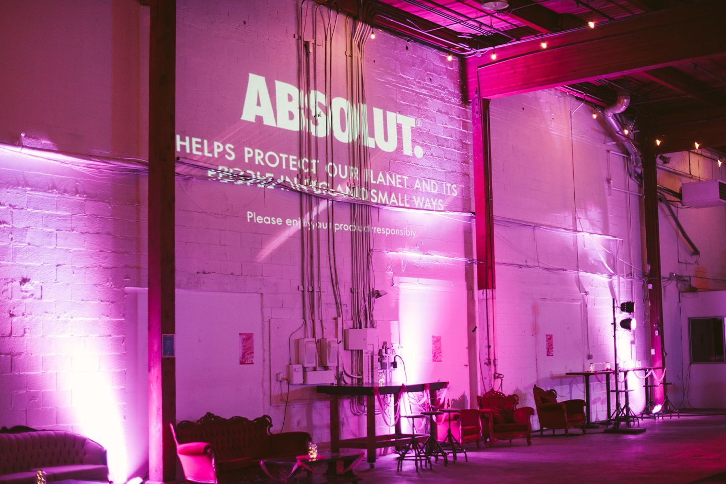 A person on a stage with a dj set up