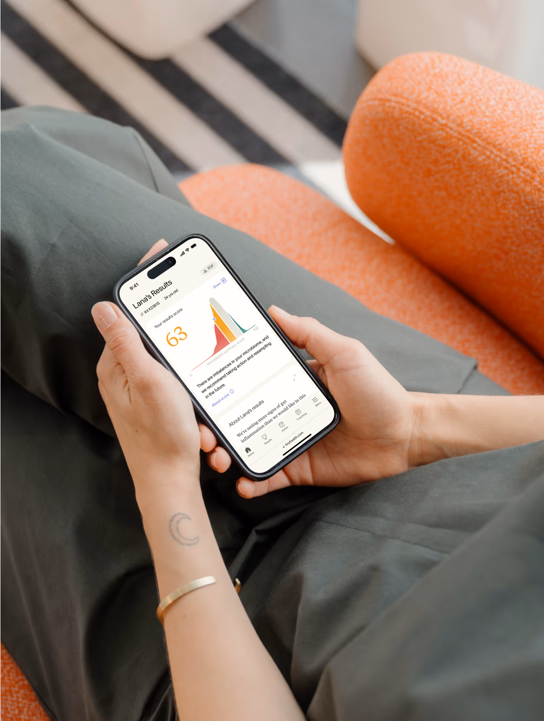 a person reading a Tiny Health report on their mobile phone.