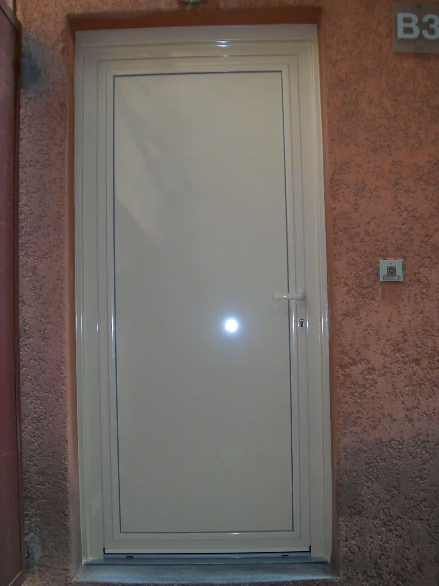 Porte aluminium panneau plein