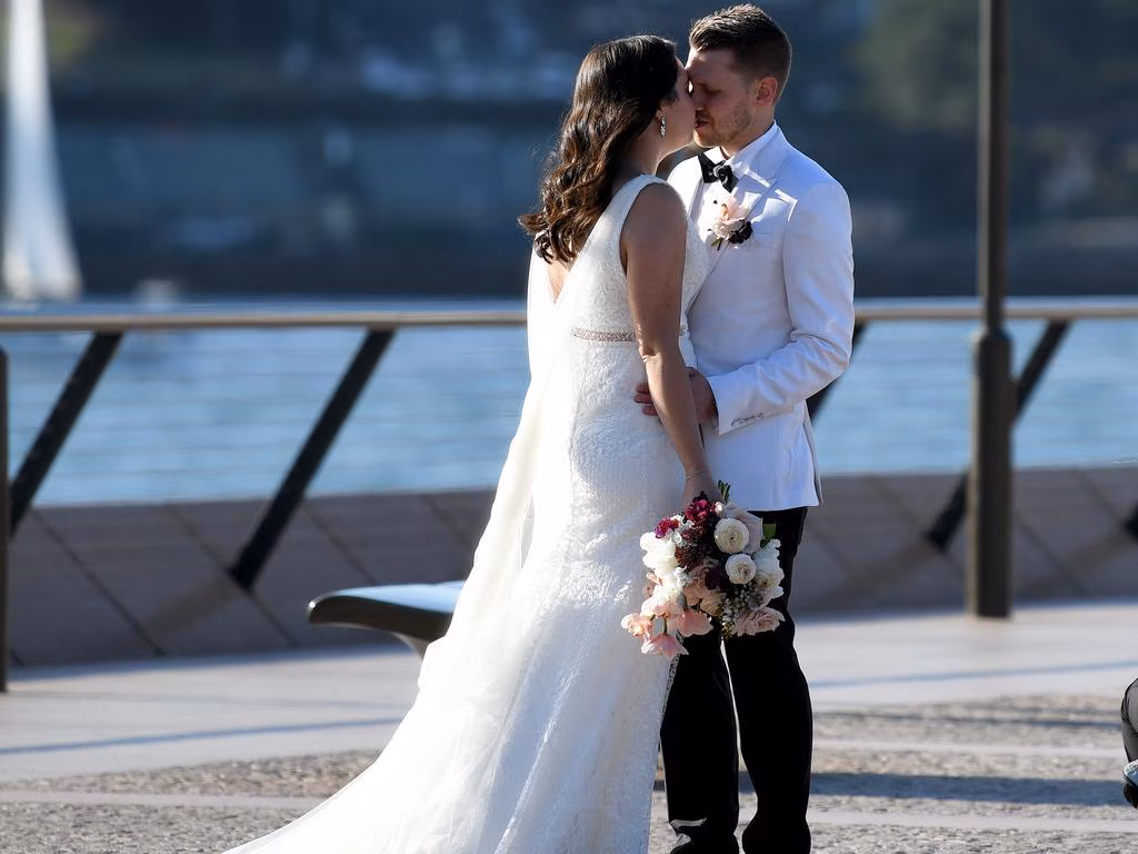Wedding couple on at the Sydney Opera House