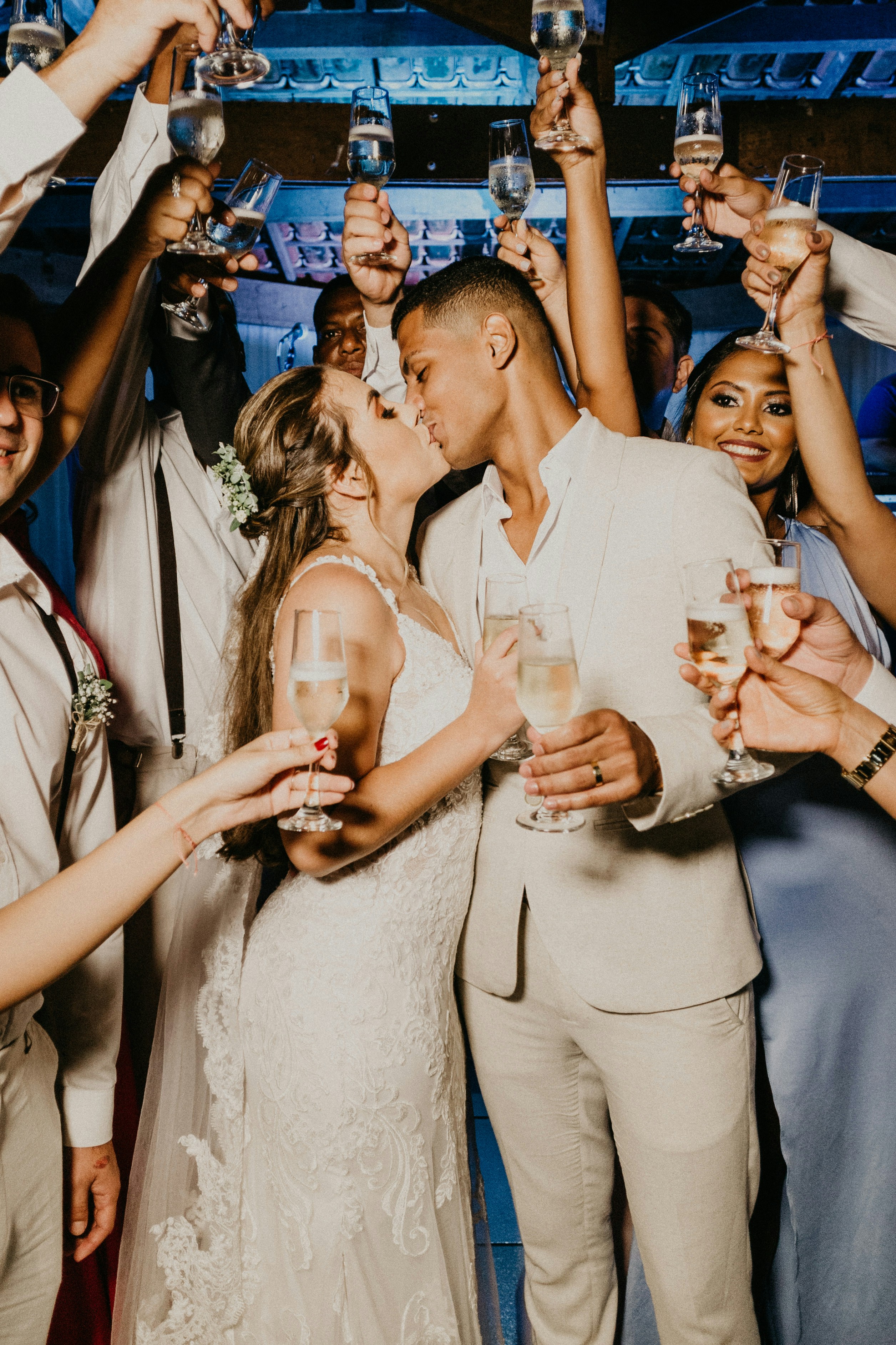 Wedding couple kissing at there celebration