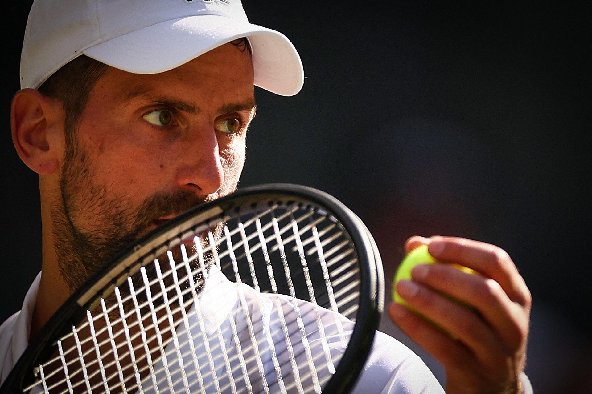 Novak Djokovic concentrating before serving.