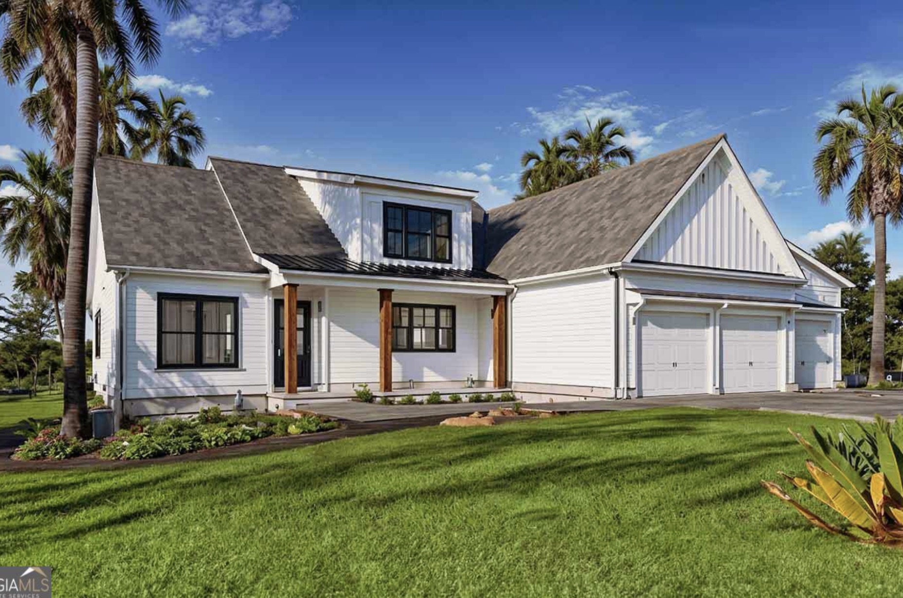 The Darien custom home with front porch at Sanctuary Cove