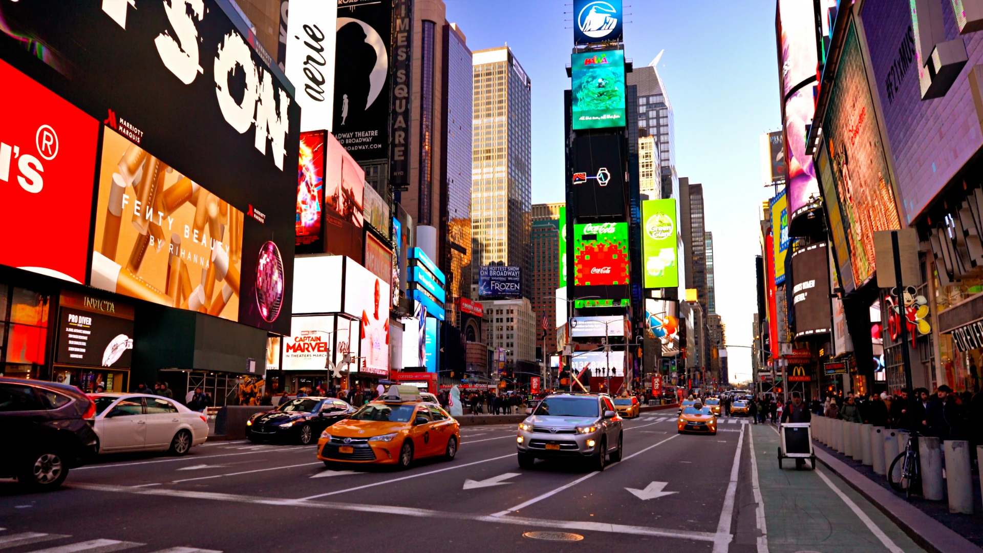 A professional award ceremony scene with individuals holding up trophies, a backdrop displaying the Longines and Dubai World Cup logos, and a decorated podium area, focusing on event sponsorship.
