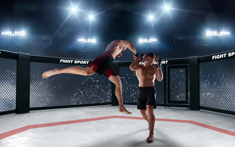 MMA fight in octagon cage—flying knee strike under bright arena lights, mixed martial arts action at combat sports event, sports marketing promotional image.