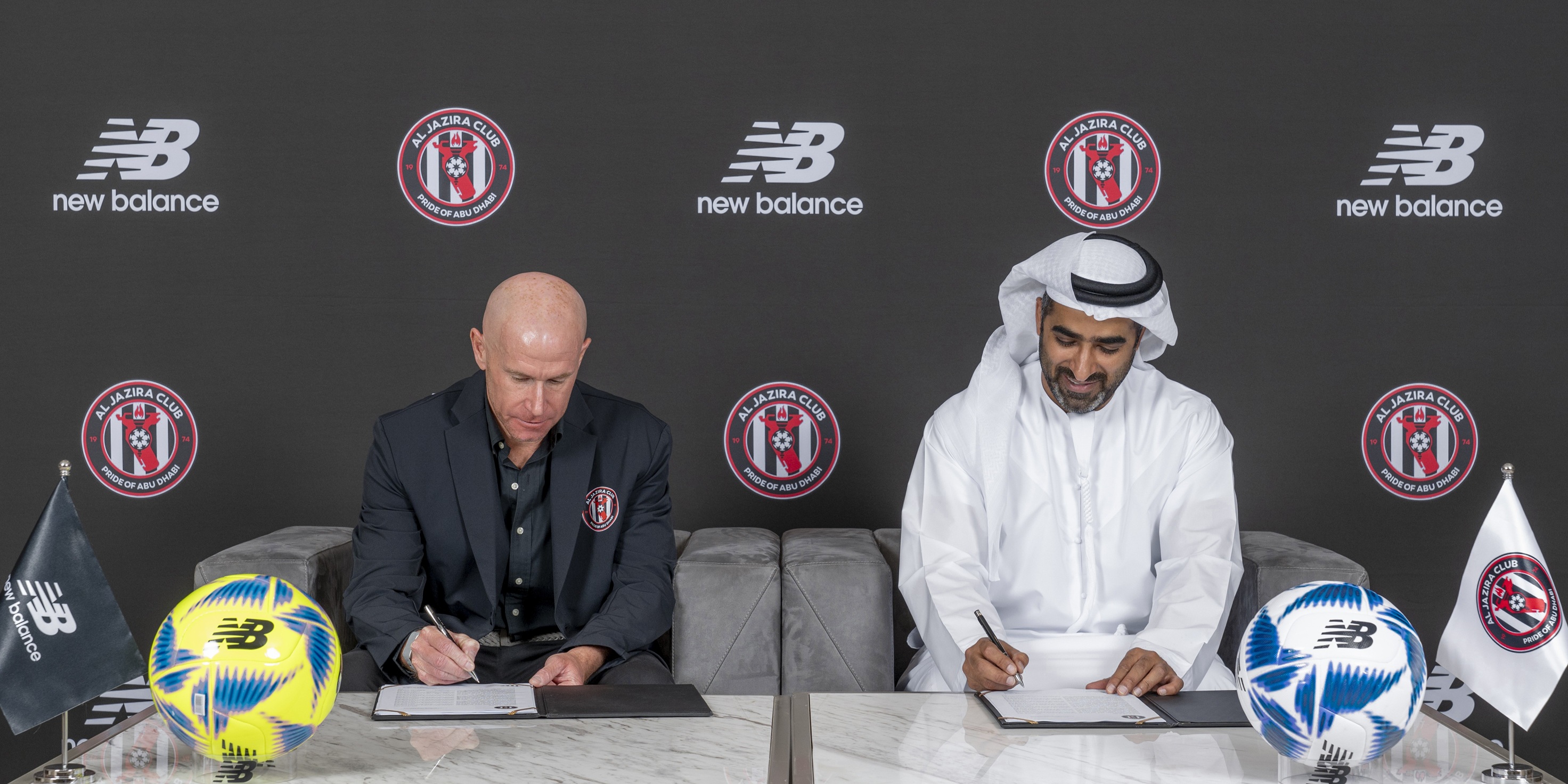 Al Jazira Club and New Balance executives at the signing ceremony for their three year kit sports sponsorship in Abu Dhabi
