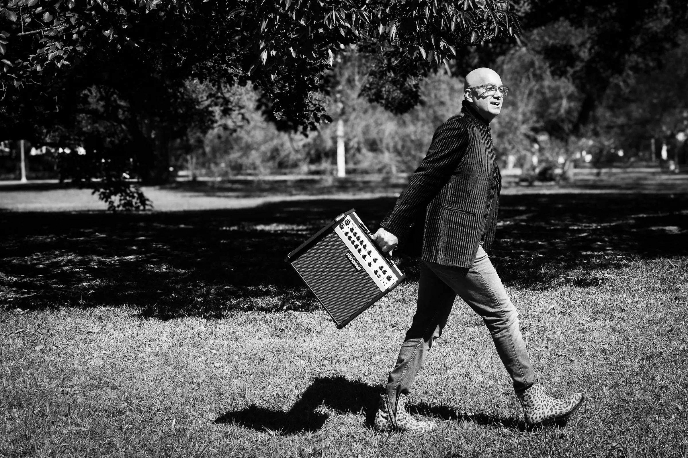 Ray Corral walking with a speaker