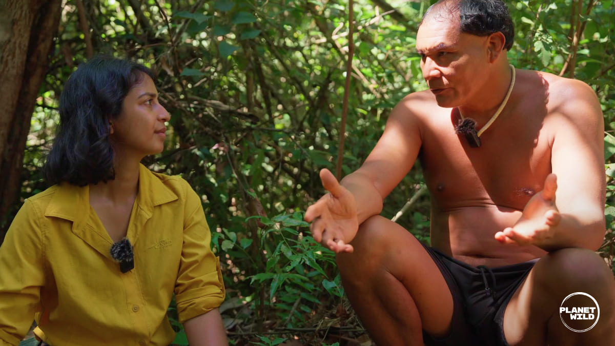 Tapi Yalawapiti explaining the TIX way of life to Trishala Naidu from Planet Wild.