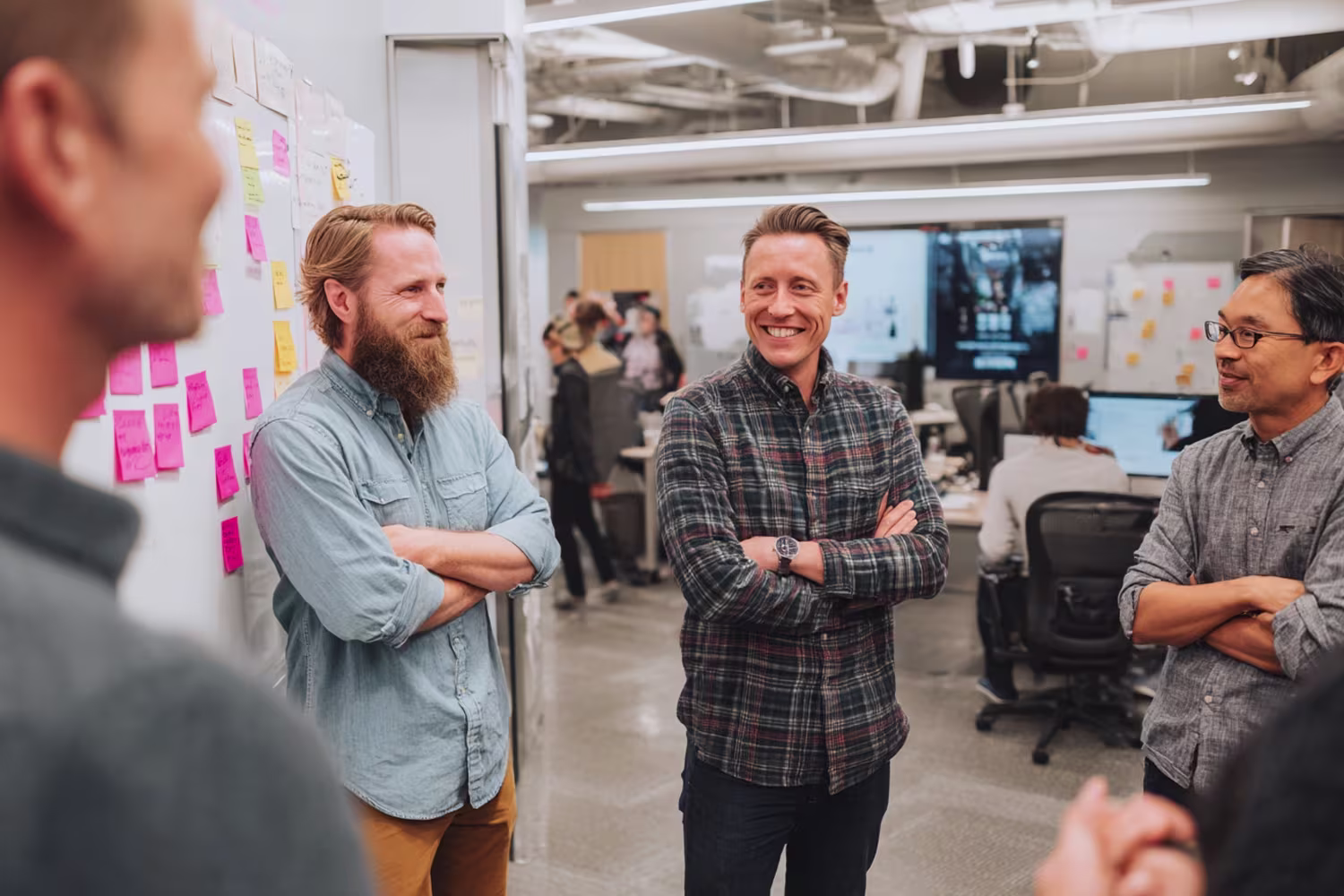Diverse IT security professionals collaborating