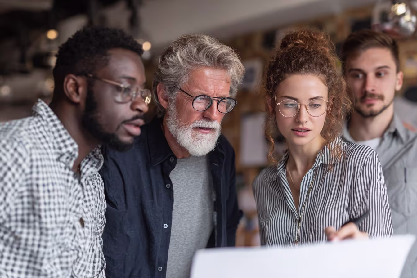 Diverse IT team discussing ITIL framework