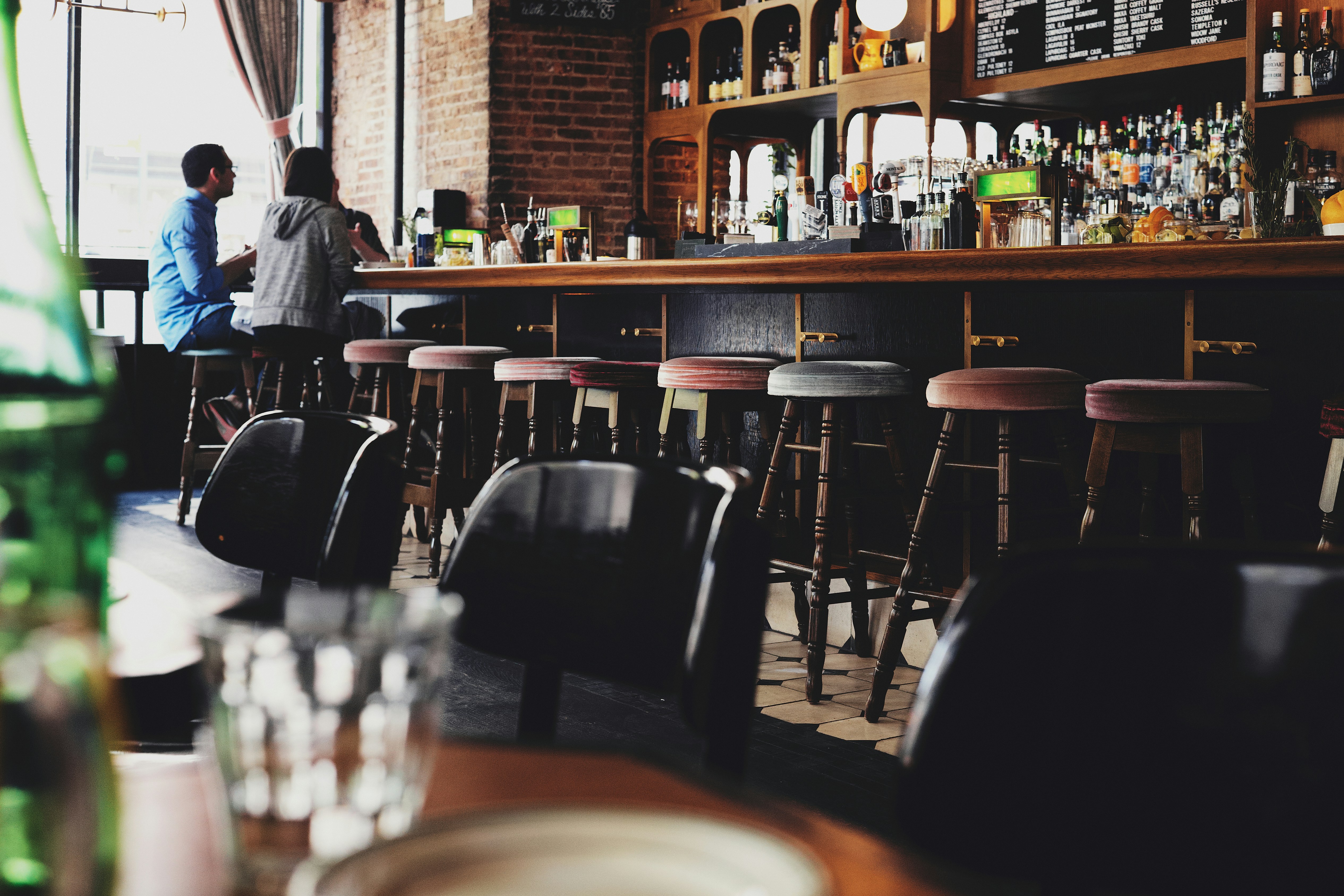 A restaurant owner reviewing expense reports
