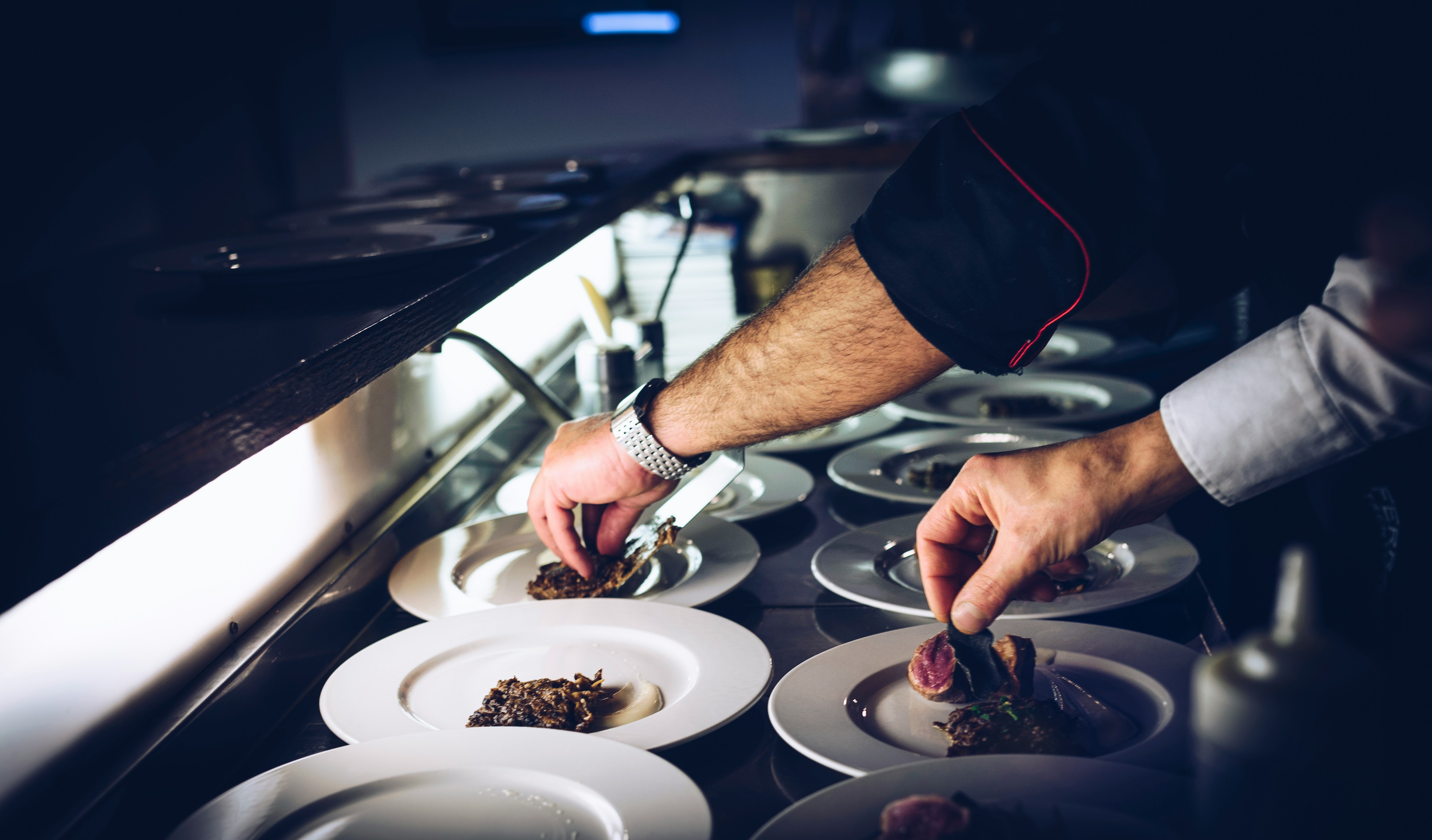 A restaurant manager reviewing menu performance