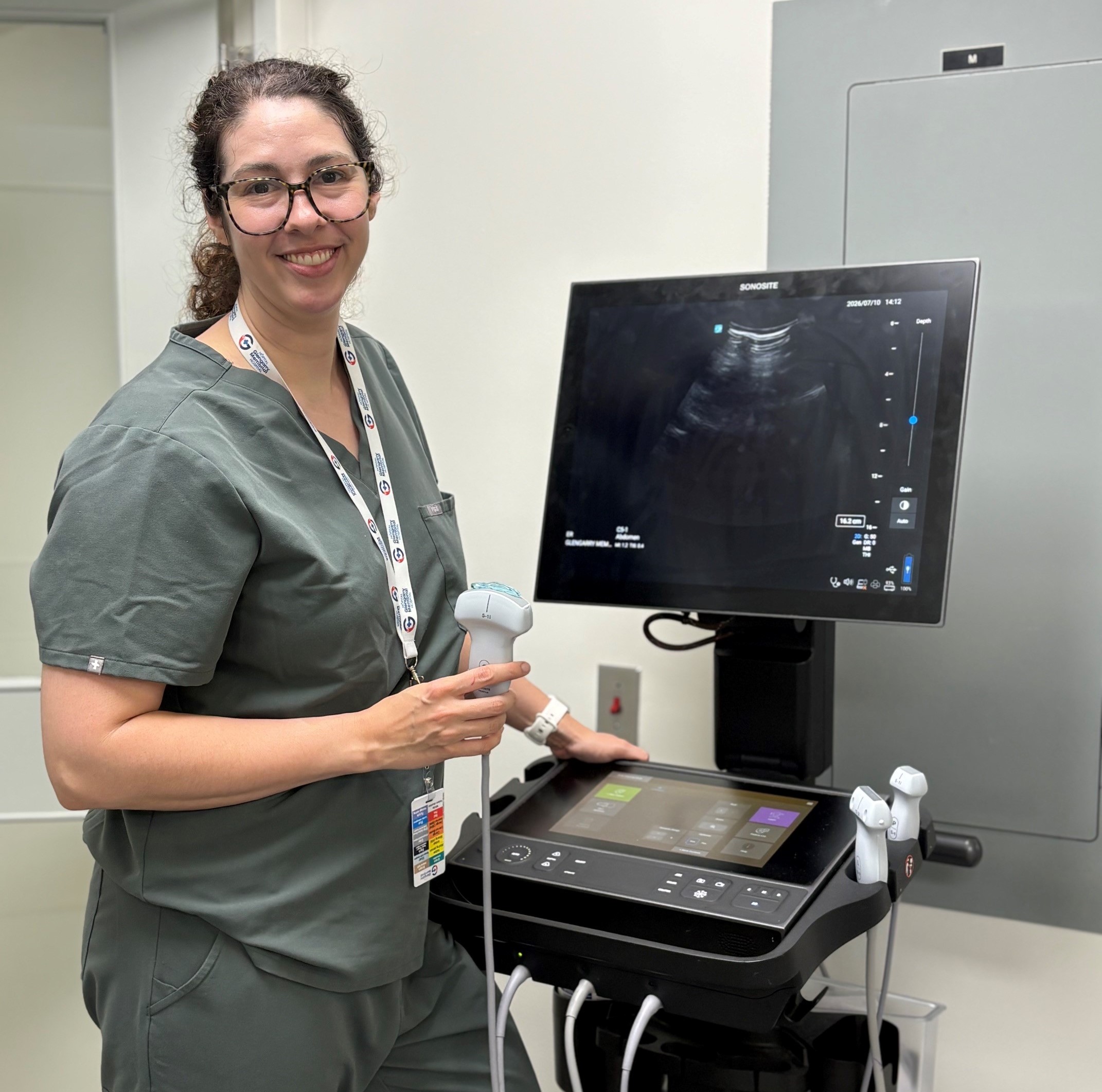 Dr. Alexa Schryver with the ultrasound machine for her POCUS fellowship