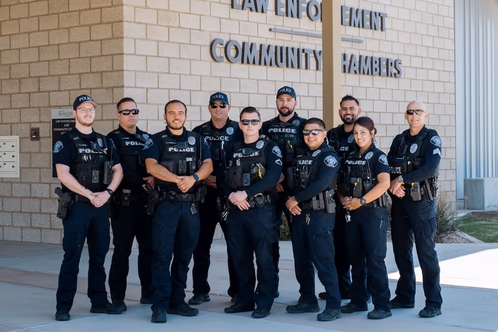 group of officers in uniform in front of the building
