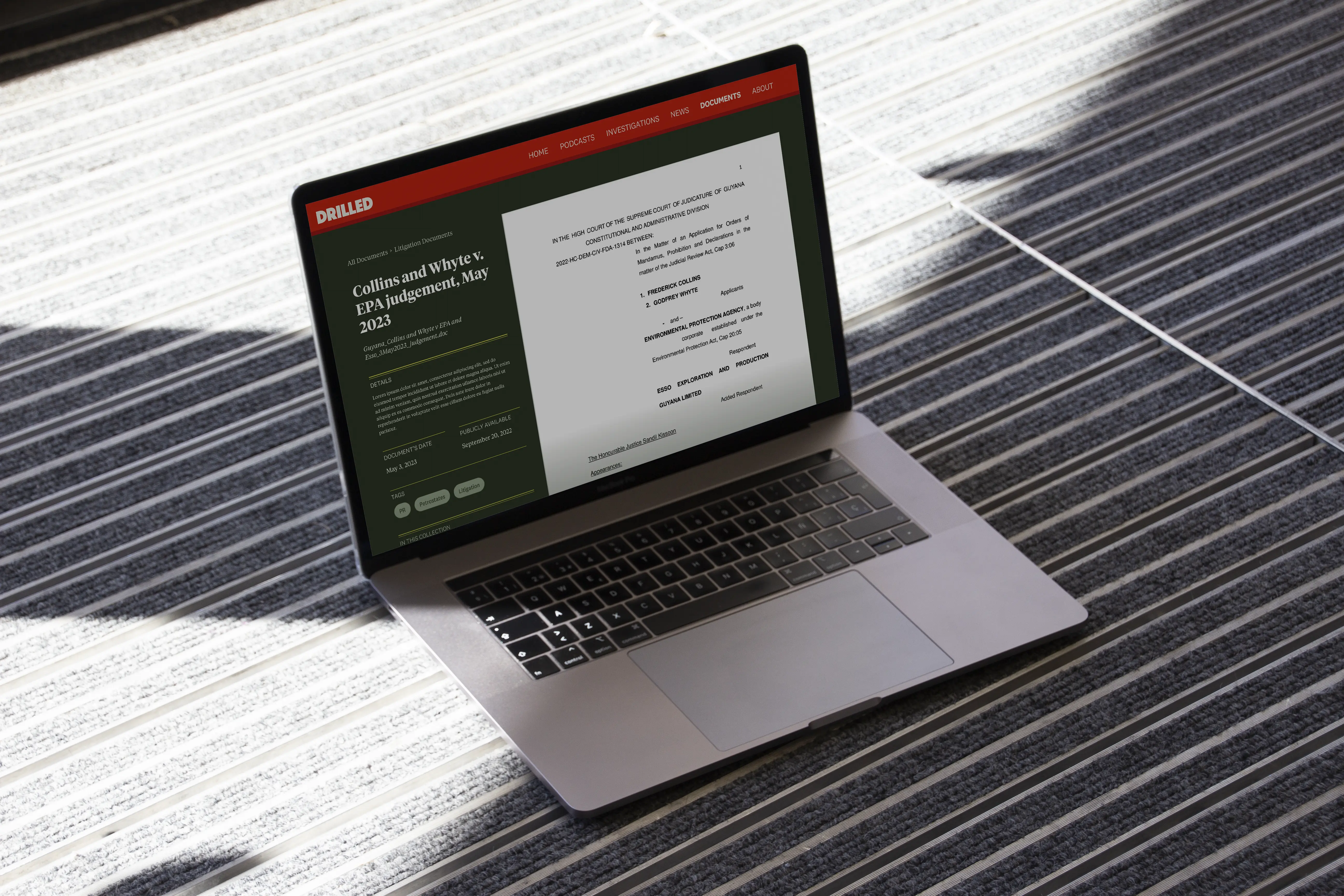 A picture of a laptop showing a document page on the Drilled website