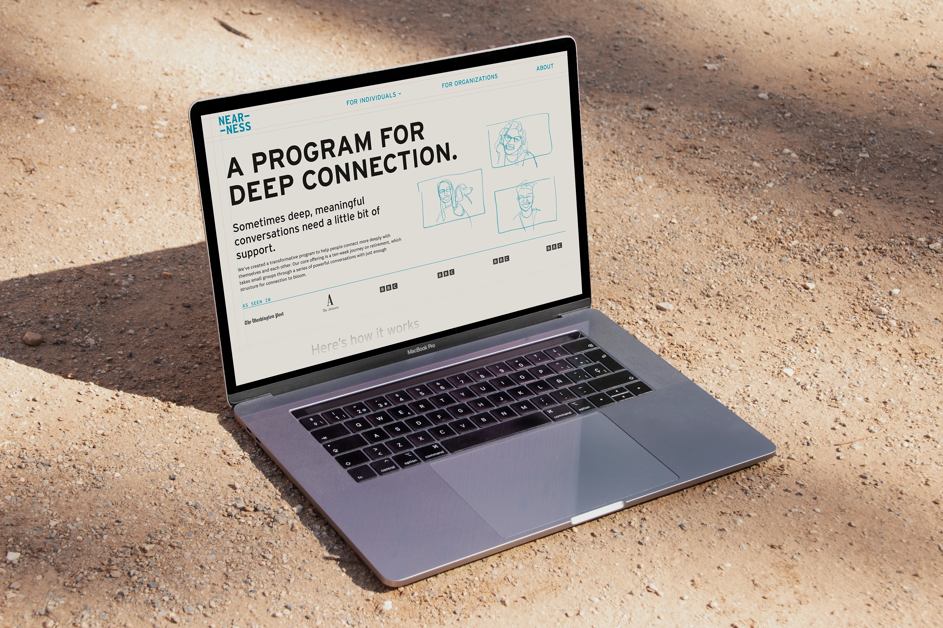 A picture of a laptop showing the Nearness homepage with their new branding