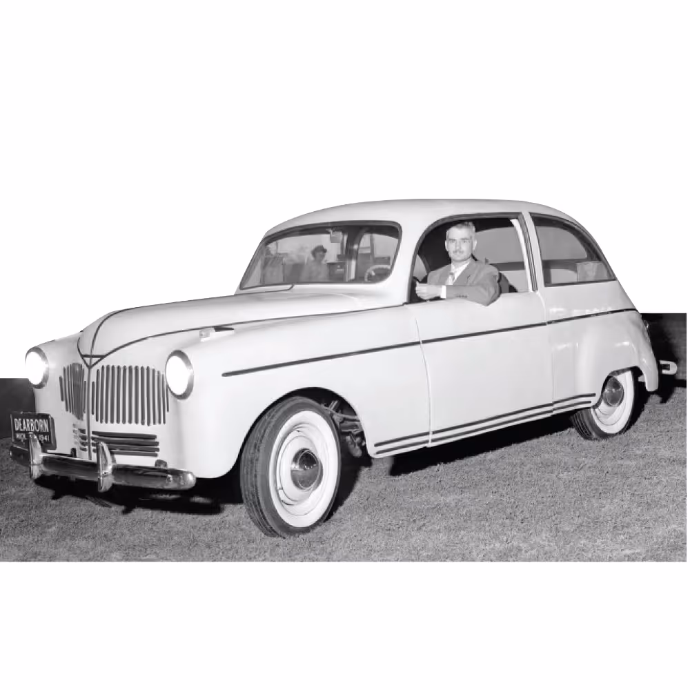 Henry Ford with the first hemp car released in 1941, showcasing hemp-based materials in automotive history.