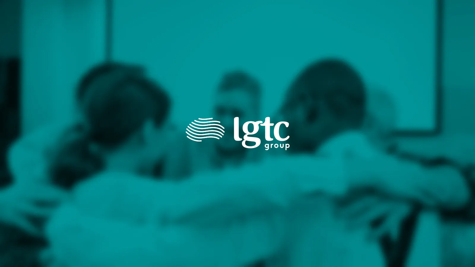 Group therapy session with diverse participants engaged in discussion, showcasing LGTC Group's supportive mental wellness services.