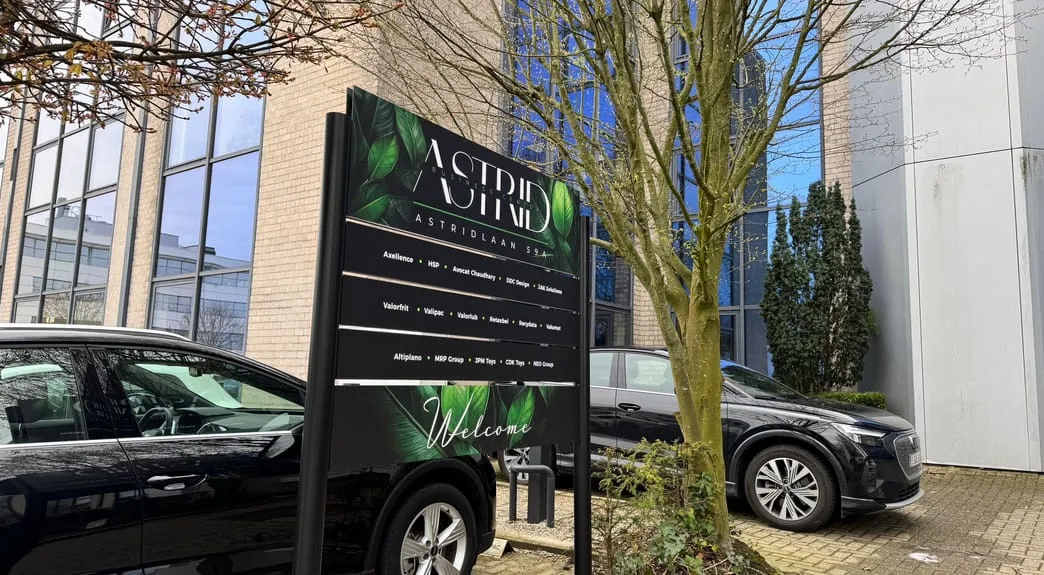 Picture of the JAK Solutions team discussing  about a project