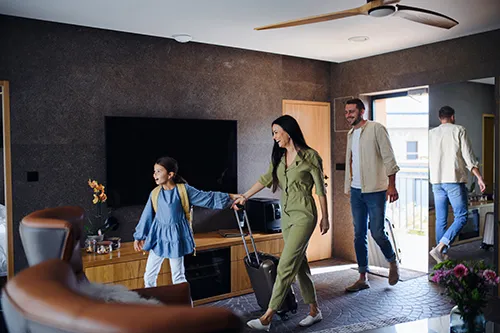 Seamless in-room connectivity with a wall plate indoor access points (APs) for hotels and resorts