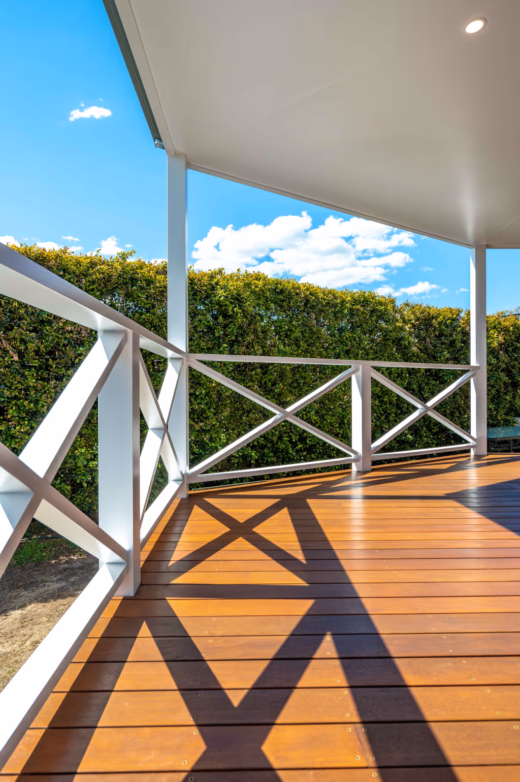 A deck surrounding a home
