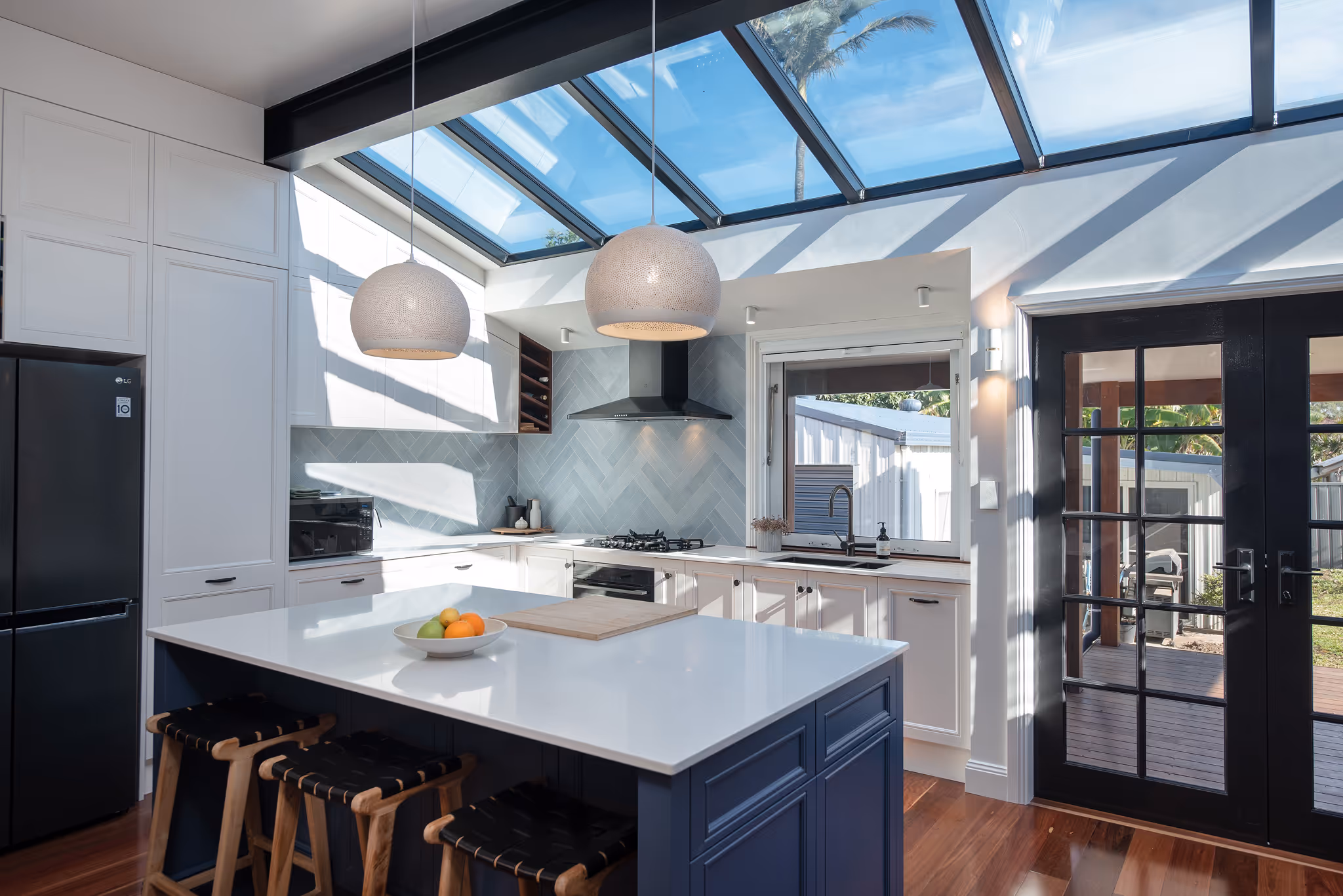 A kitchen with a skylight