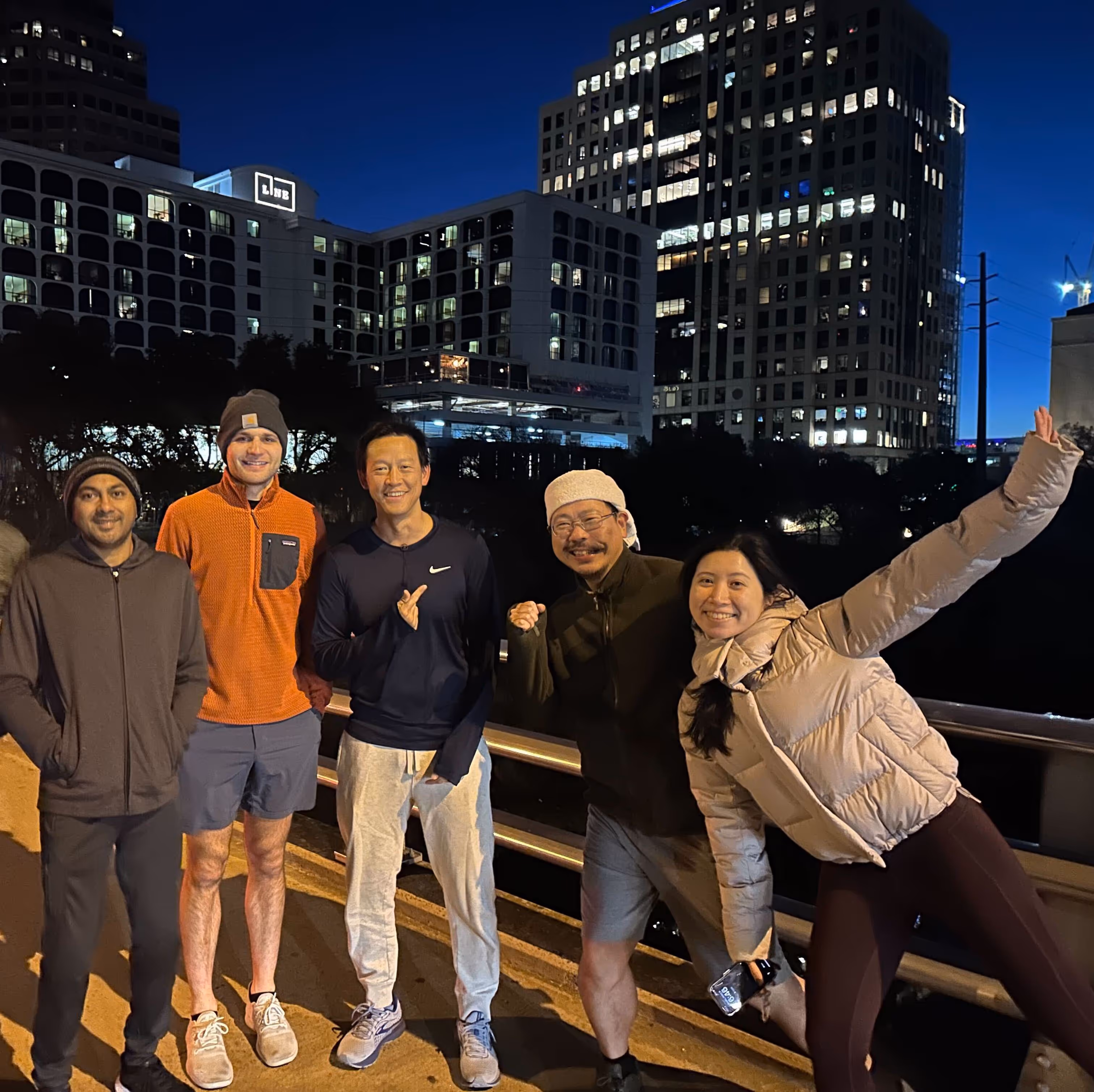 Several Verdigris team members out for a run or walk at night in Austin, TX while at a team offsite