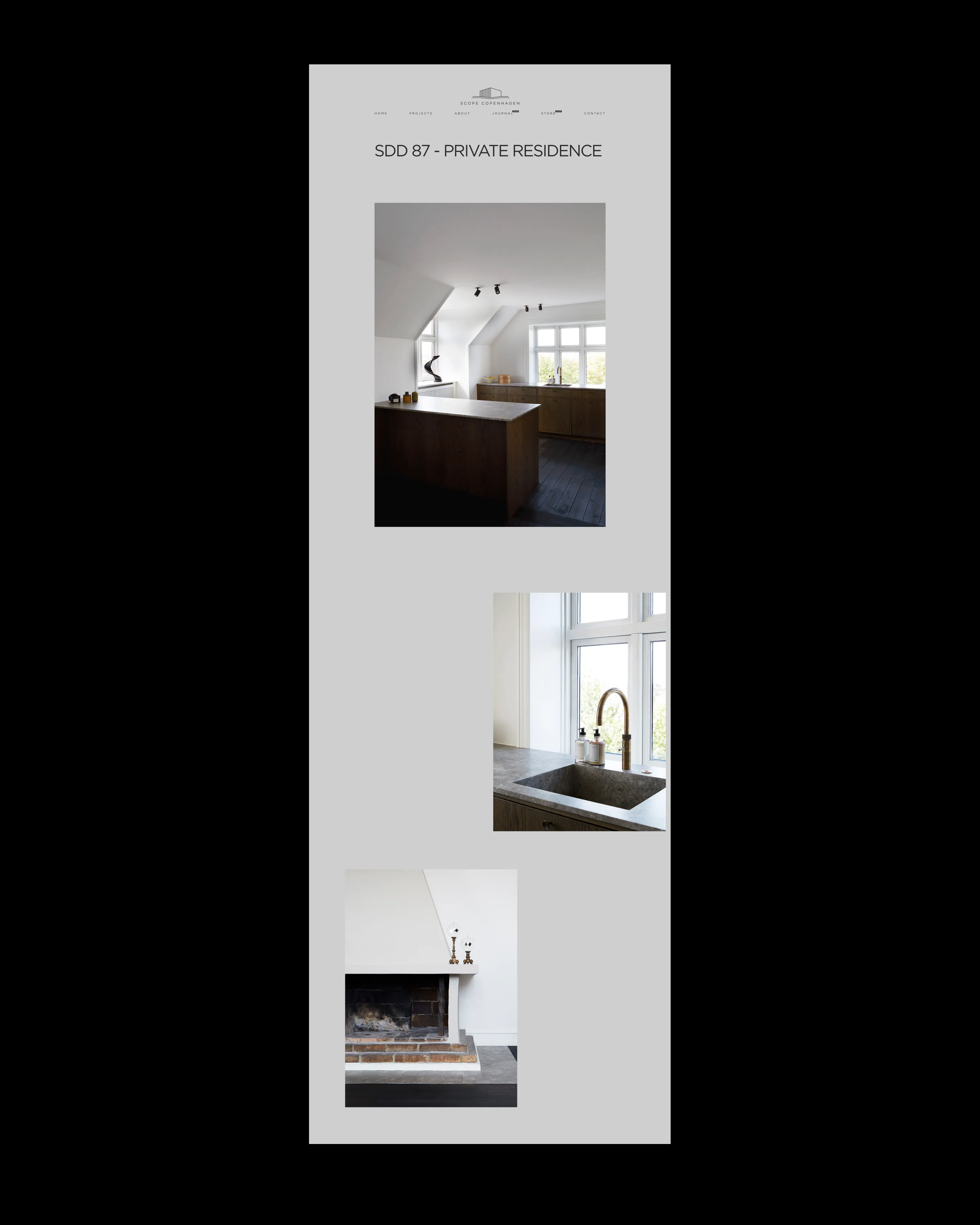 Modern kitchen with dark wooden cabinets, concrete sink by window, and white fireplace with brass candlesticks.